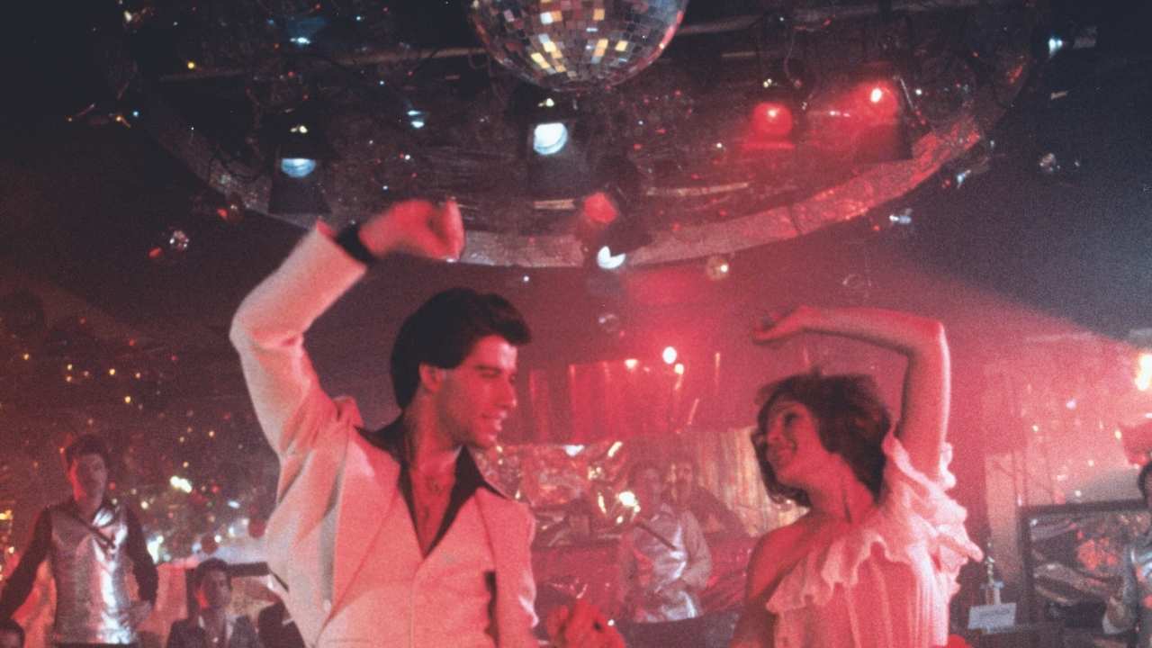 two people disco dancing